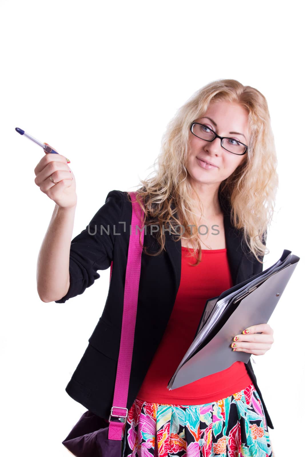 Pretty student girl pointing with pen isolated on white