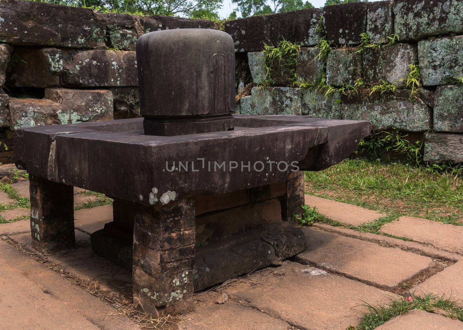 Linga in the Yoni at My Son Cham Sanctuary in Vietnam. by Claudine