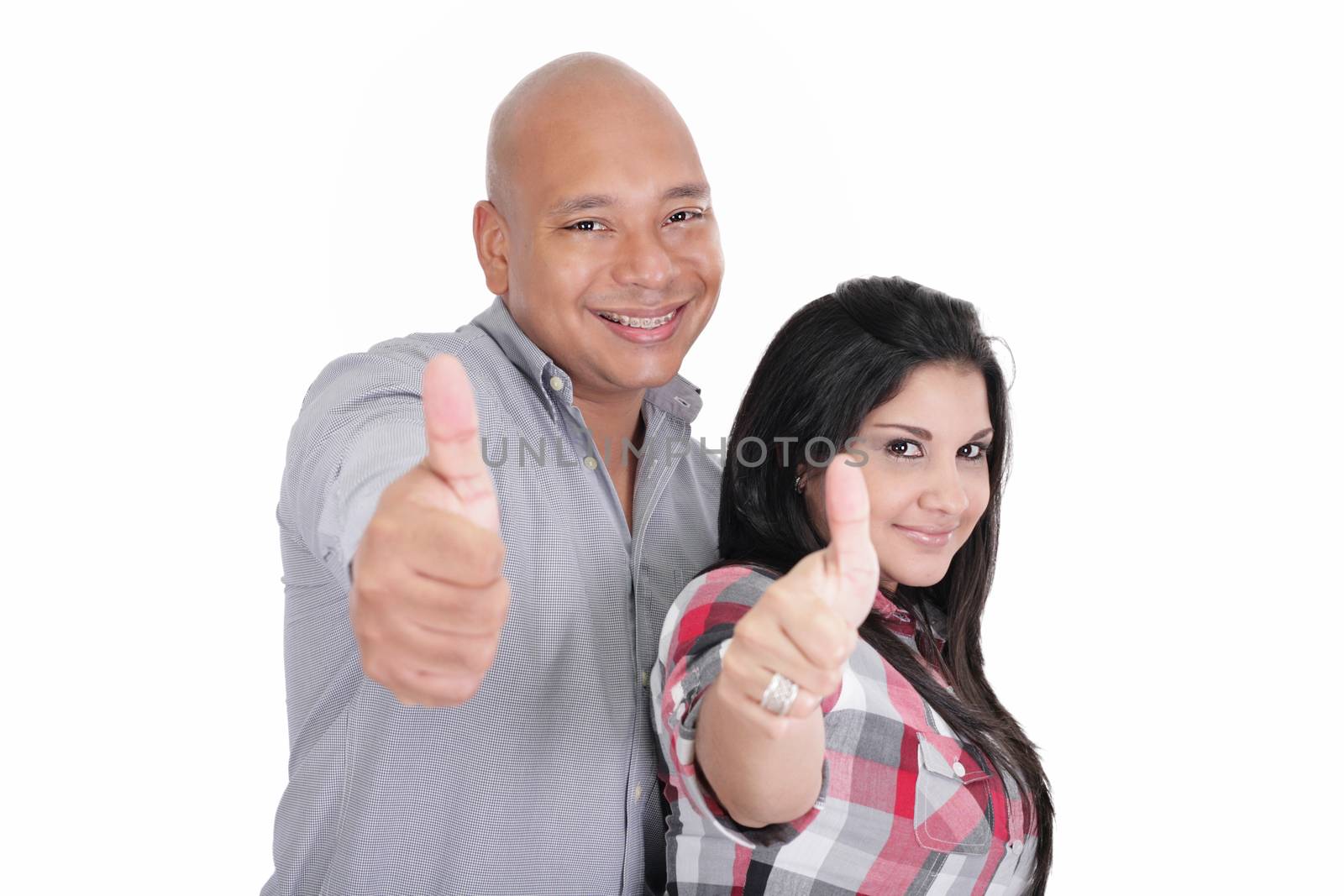 Portrait of happy couple with thumbs up sign isolated on white background