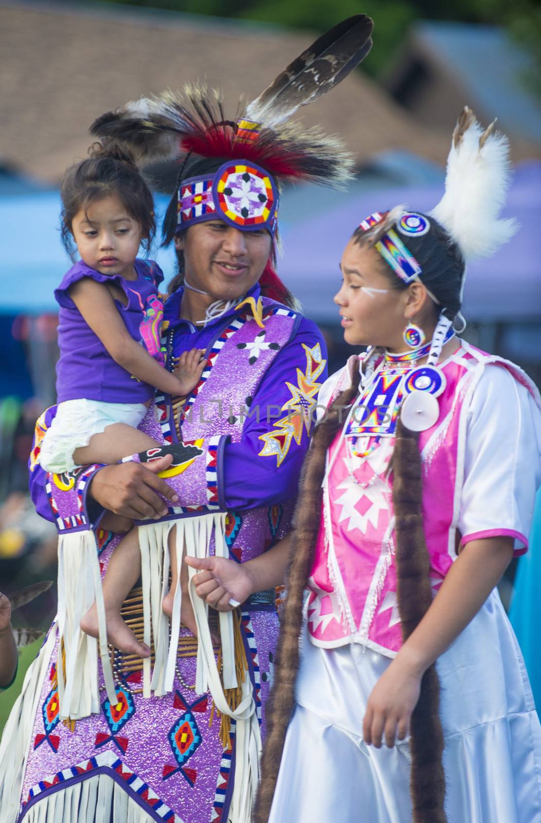 MARIPOSA ,USA - MAY 11 : An unidentified Native Indian family takes part at the Mariposa 20th annual Pow Wow in California , USA on May 11 2013 ,Pow wow is native American cultural gathernig event.