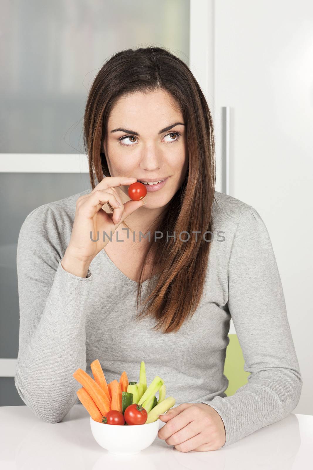 Beautiful girl eating vegetables by vwalakte