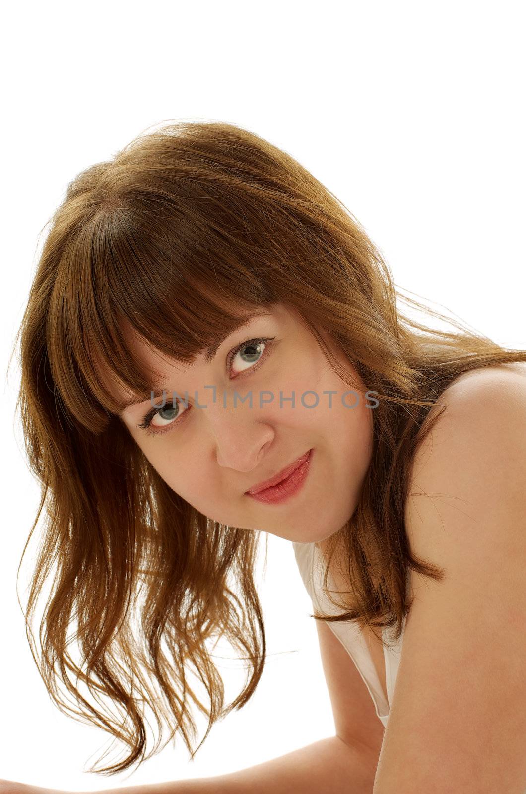 Attractive Ginger Hair Young Woman Looking at Camera and Smiling closeup on white background