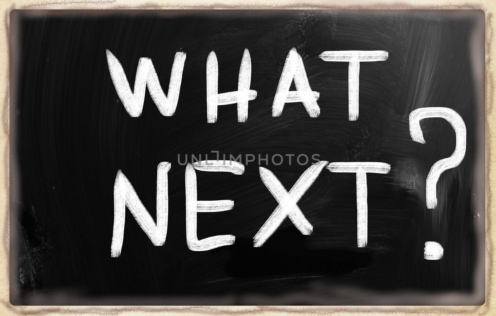 business ideas handwritten with white chalk on a blackboard.