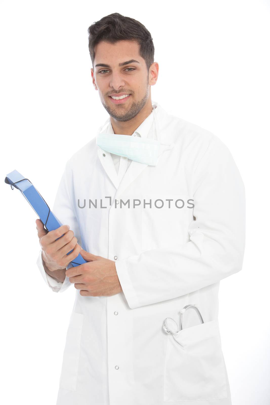 Handsome friendly young male doctor in a white lab coat standing holding a file in his hand and smiling at the camera, isolated on white