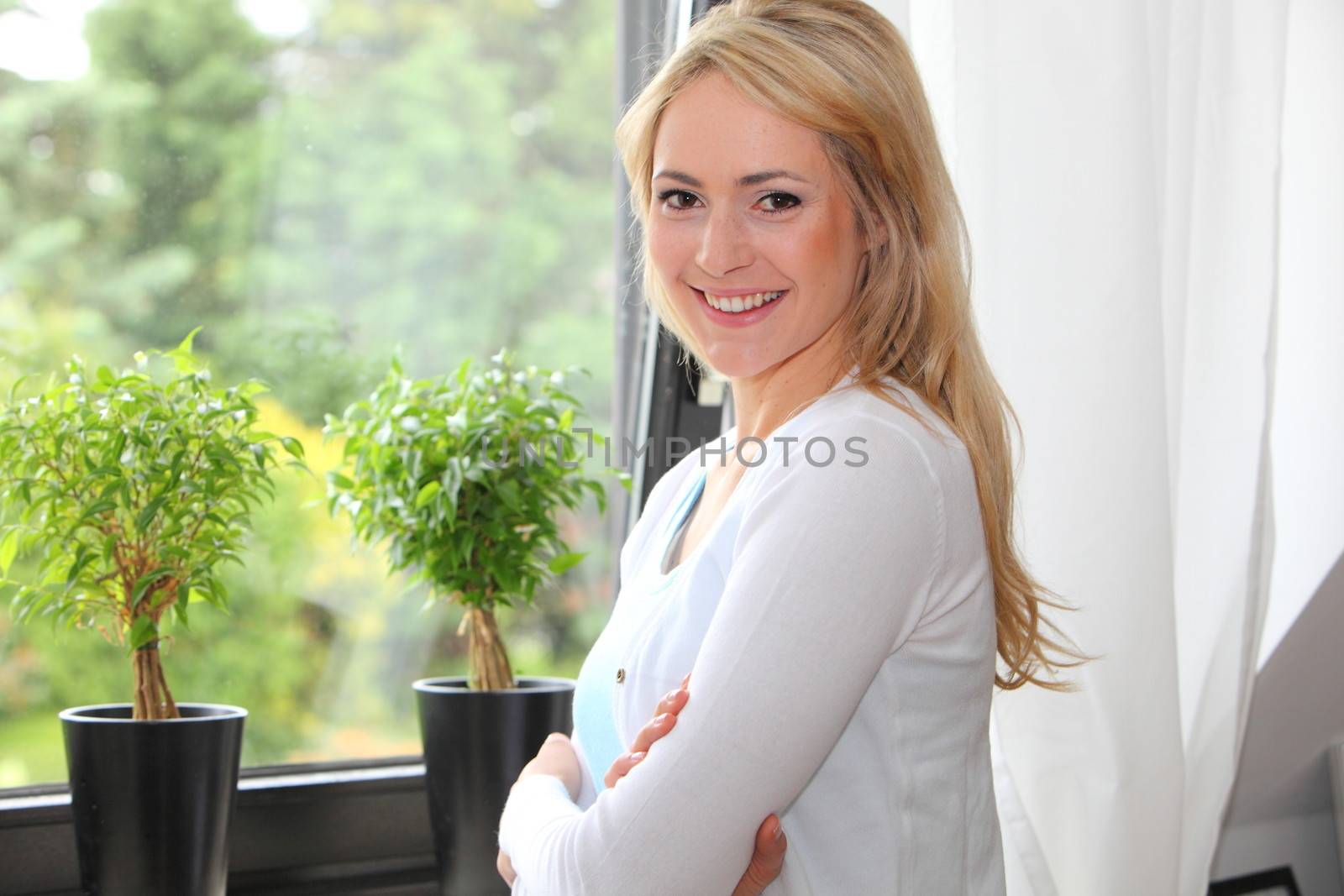 Beautiful woman in front of a view window by Farina6000