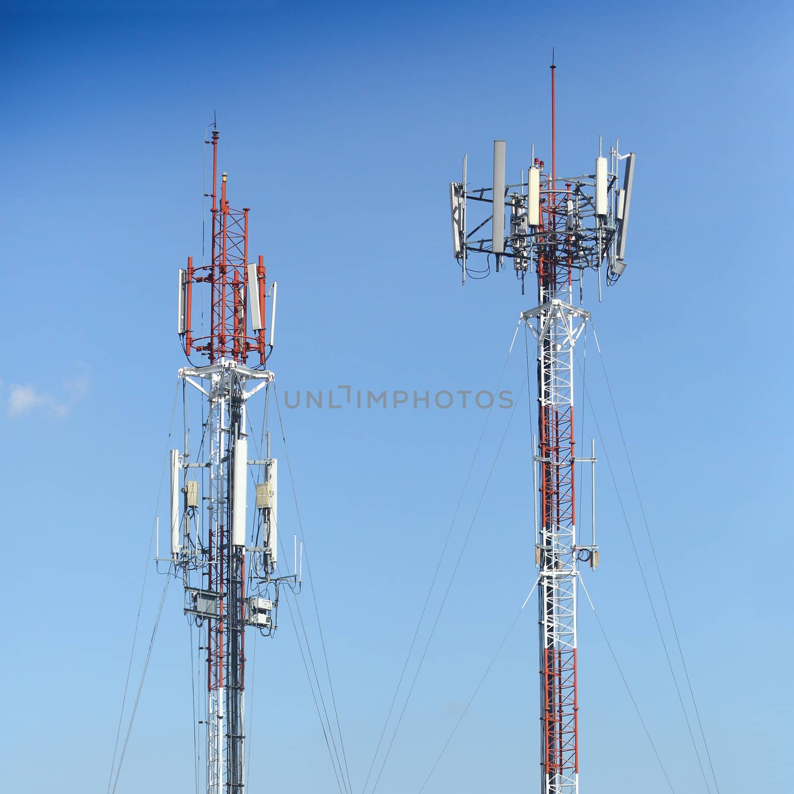 Transmission towers in blue sky background