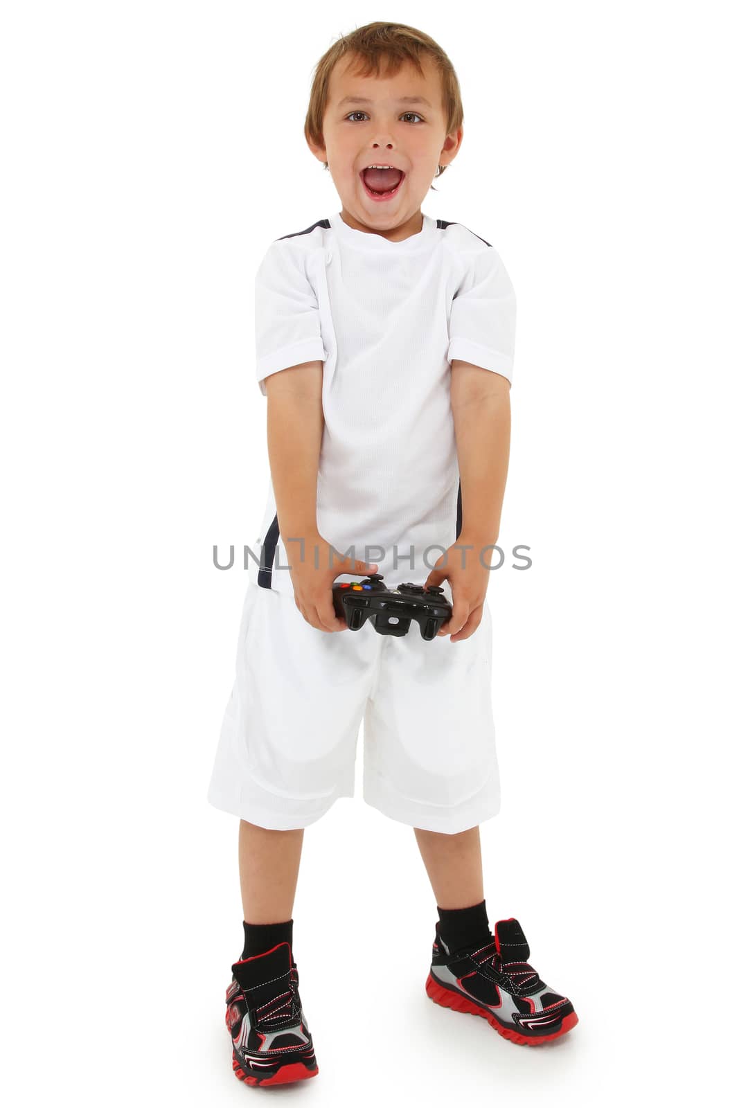 Adorable caucasian preschool boy with game controller and happy  by duplass