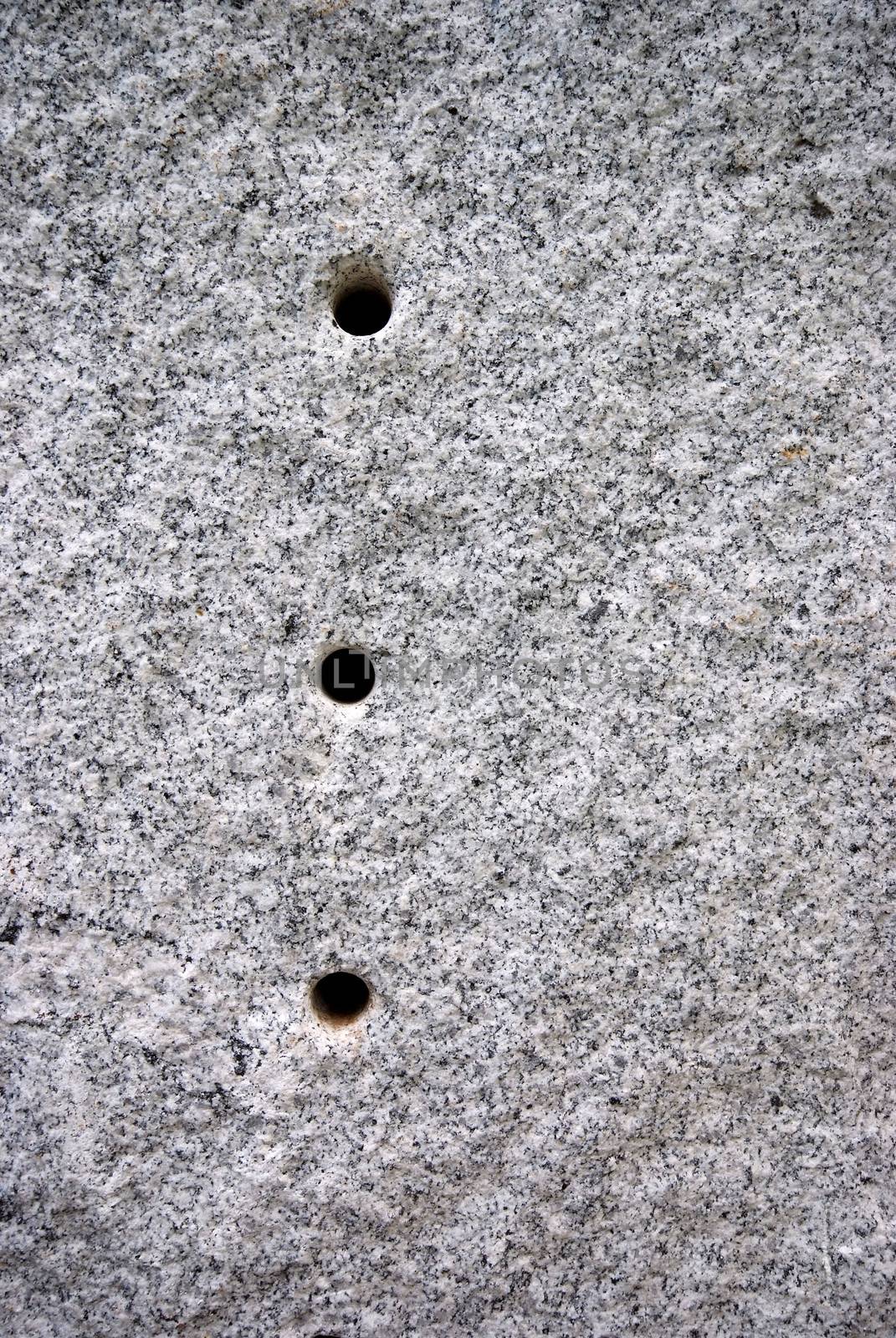 Round hole on the granite.The surface of Black and white granite stone. For texture background
