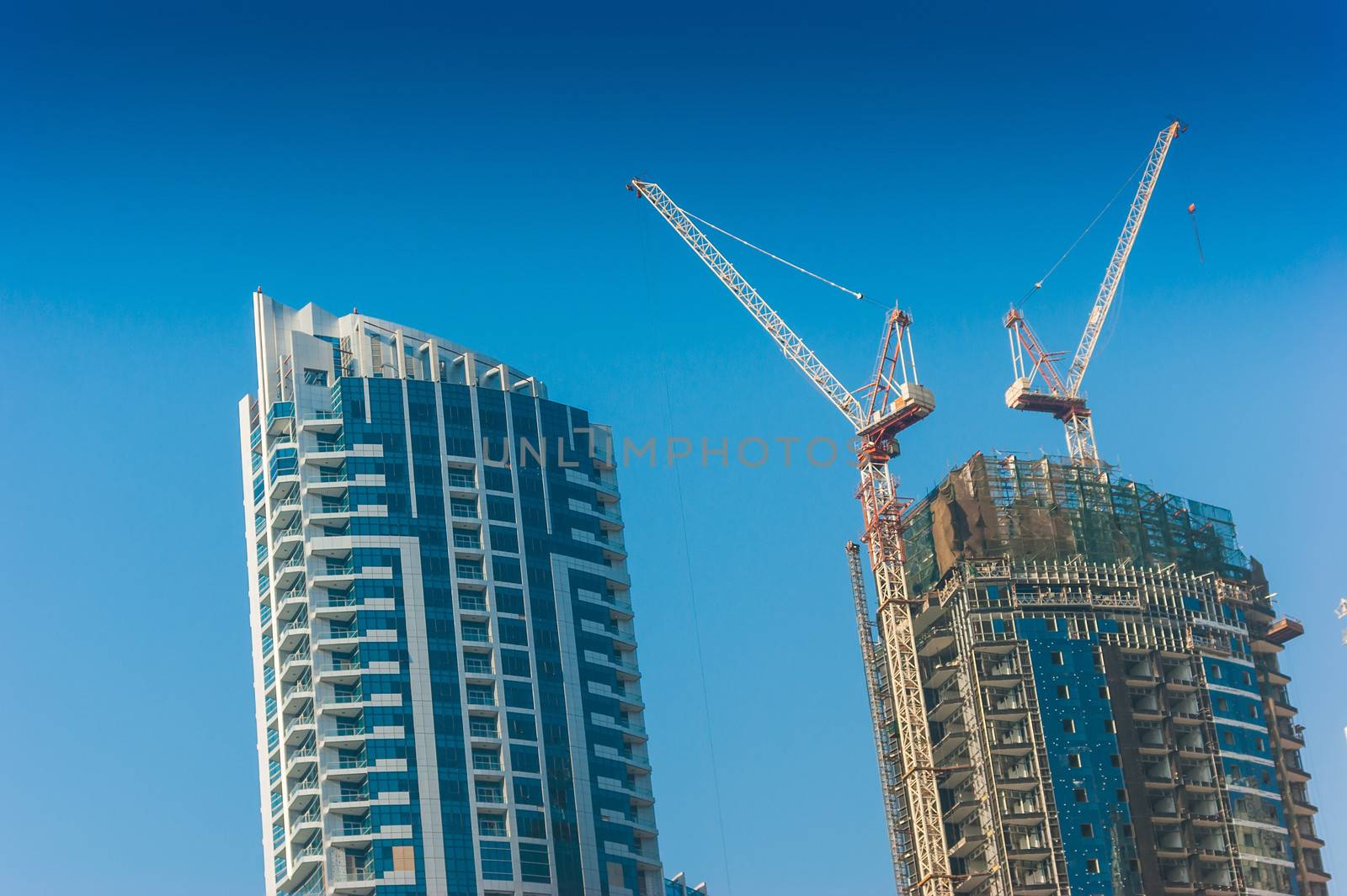  High rise buildings and streets in Dubai, UAE by oleg_zhukov