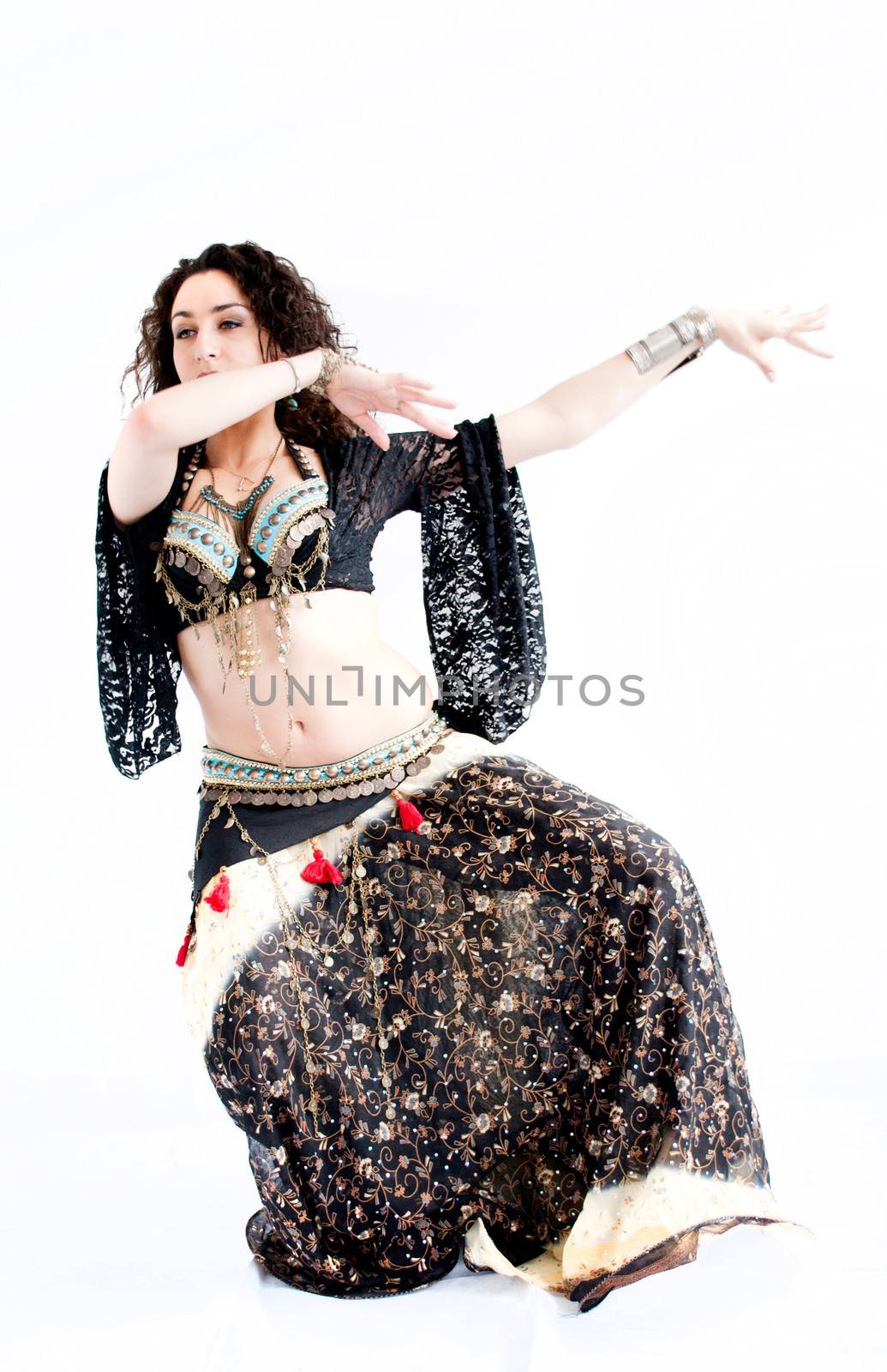 exotic young belly dancer, oriental dance isolated on white background