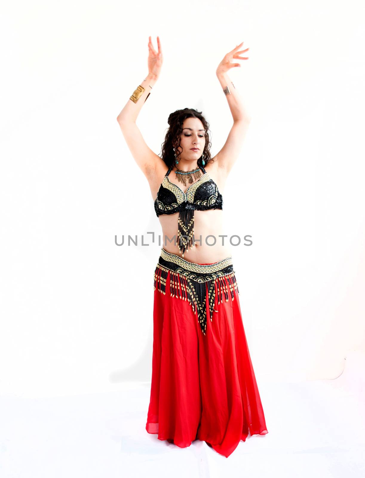 exotic young belly dancer, oriental dance isolated on white background