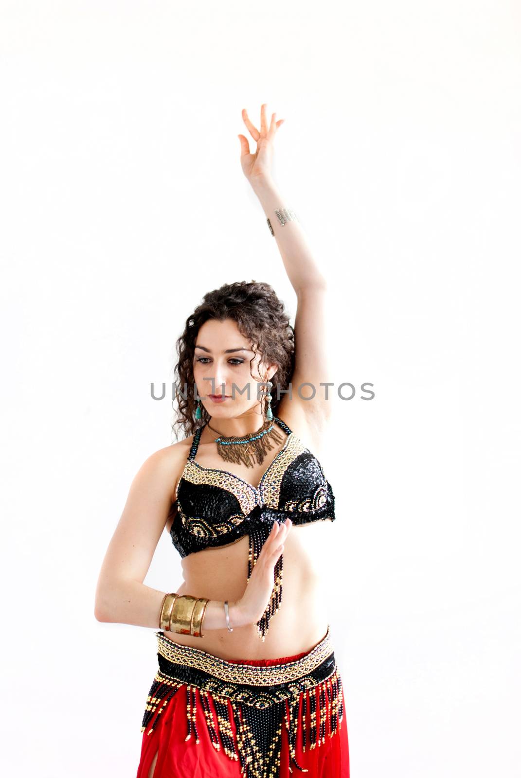 exotic young belly dancer, oriental dance isolated on white background