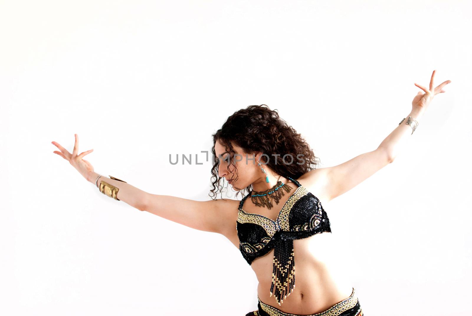 exotic young belly dancer, oriental dance isolated on white background