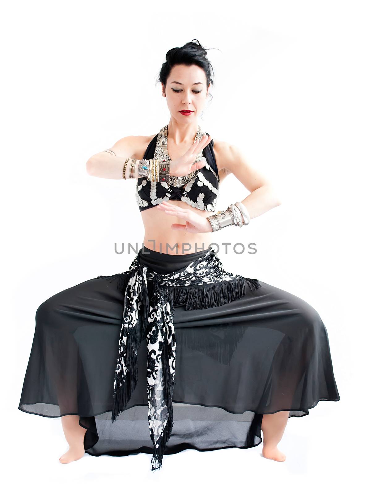 exotic young belly dancer, oriental dance isolated on white background