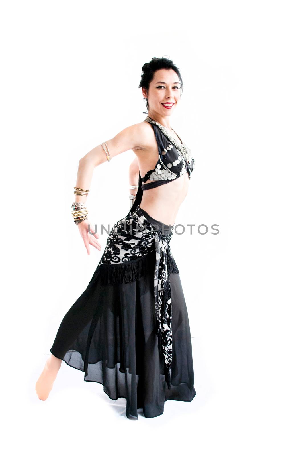 exotic young belly dancer, oriental dance isolated on white background