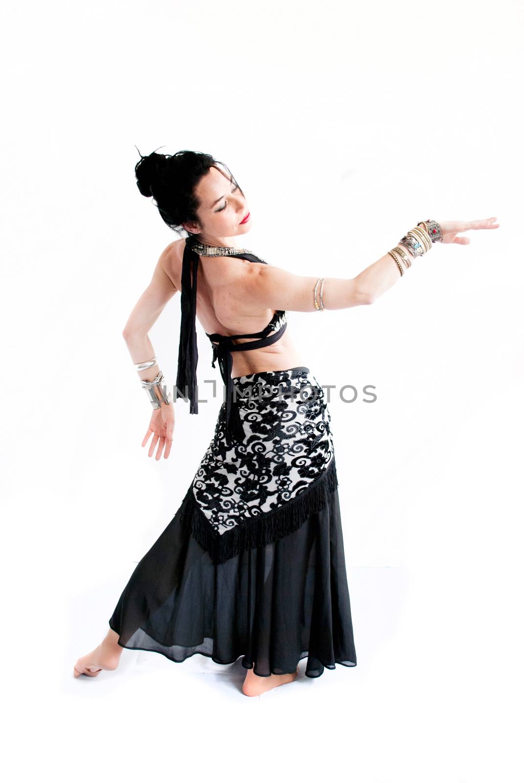 exotic young belly dancer, oriental dance isolated on white background