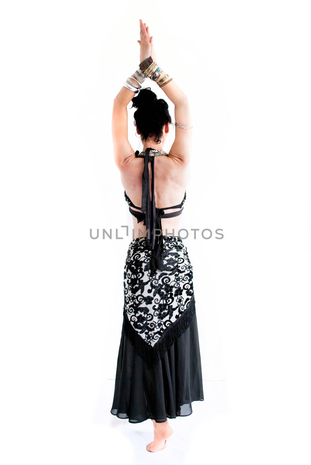 exotic young belly dancer, oriental dance isolated on white background