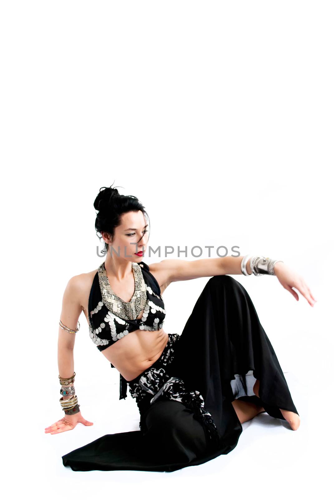 exotic young belly dancer, oriental dance isolated on white background