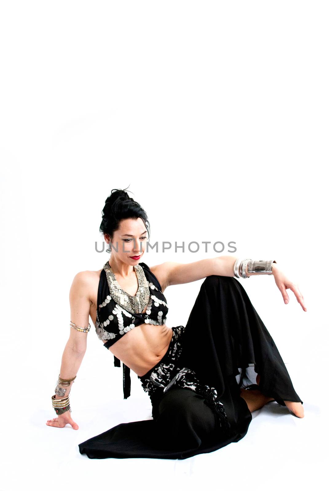 exotic young belly dancer, oriental dance isolated on white background