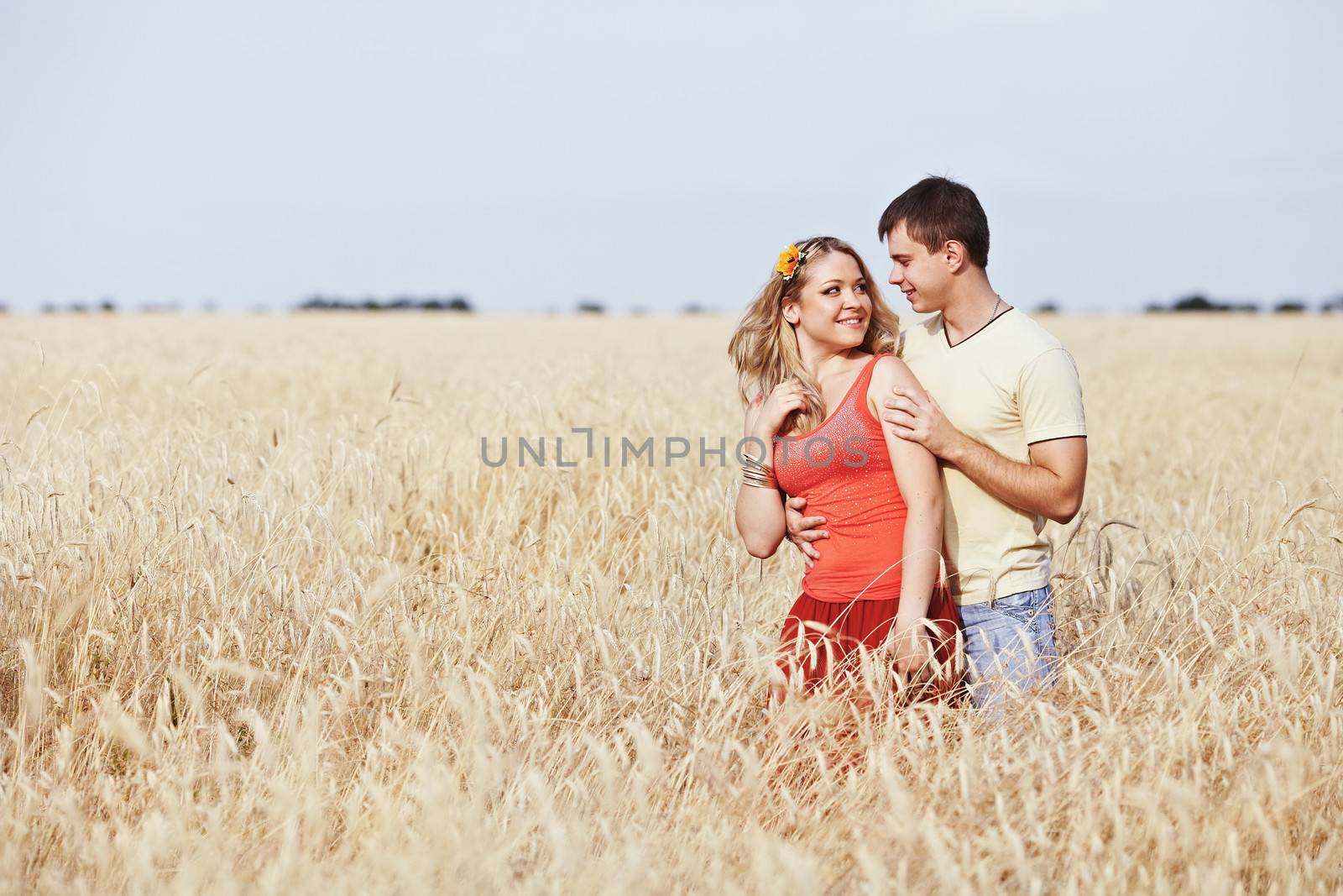 Laughing children in wheat field