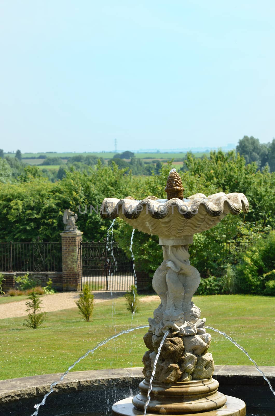 Fountain in classical  english garden