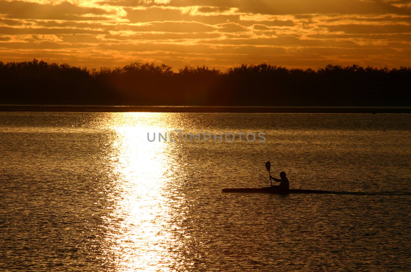 Kayaking in the early morning light.