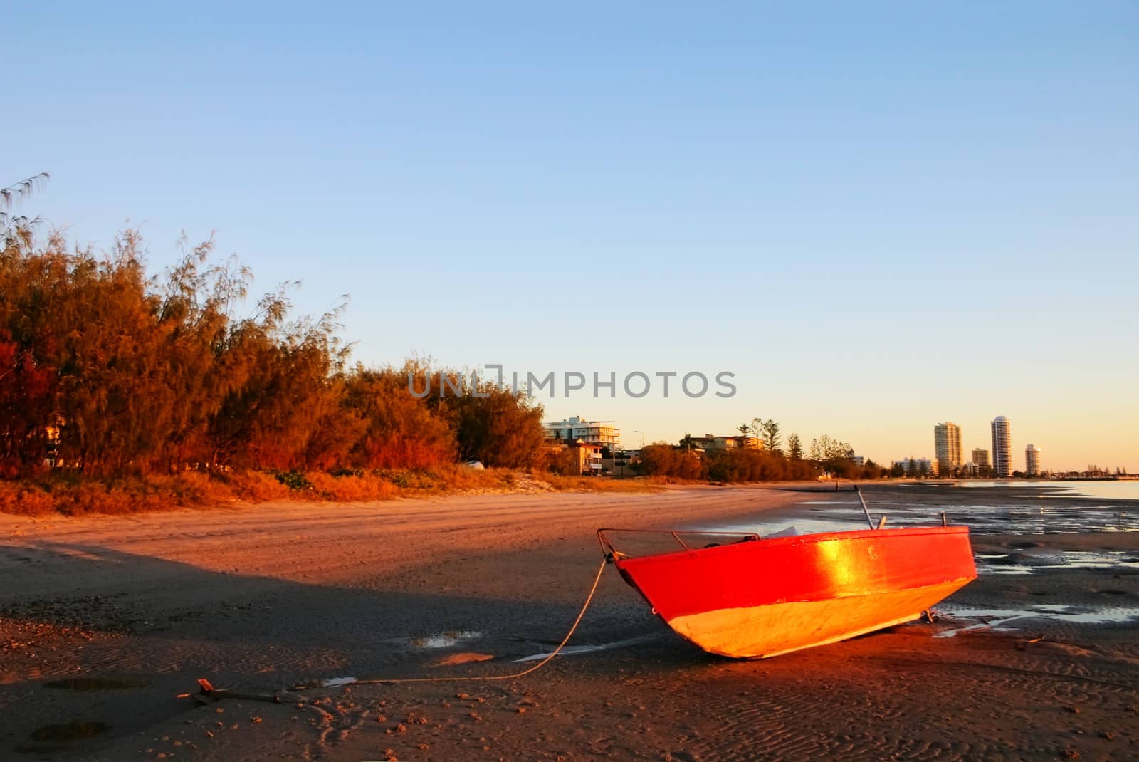 Red Boat At Sunrise by jabiru