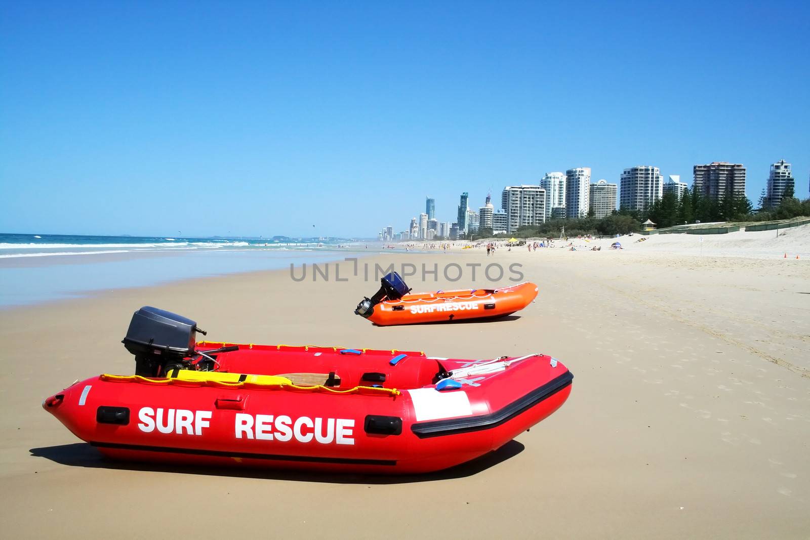 Surf rescue boats on Southport beach looking towards Surfers Paradise on the Gold Coast Australia.