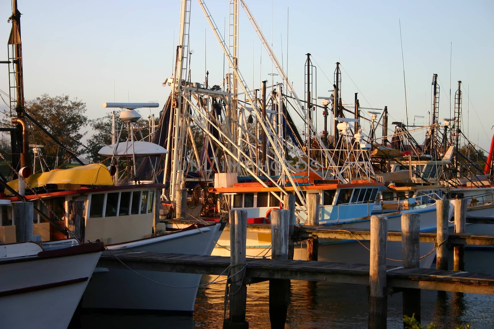 Trawlers At Sunset by jabiru