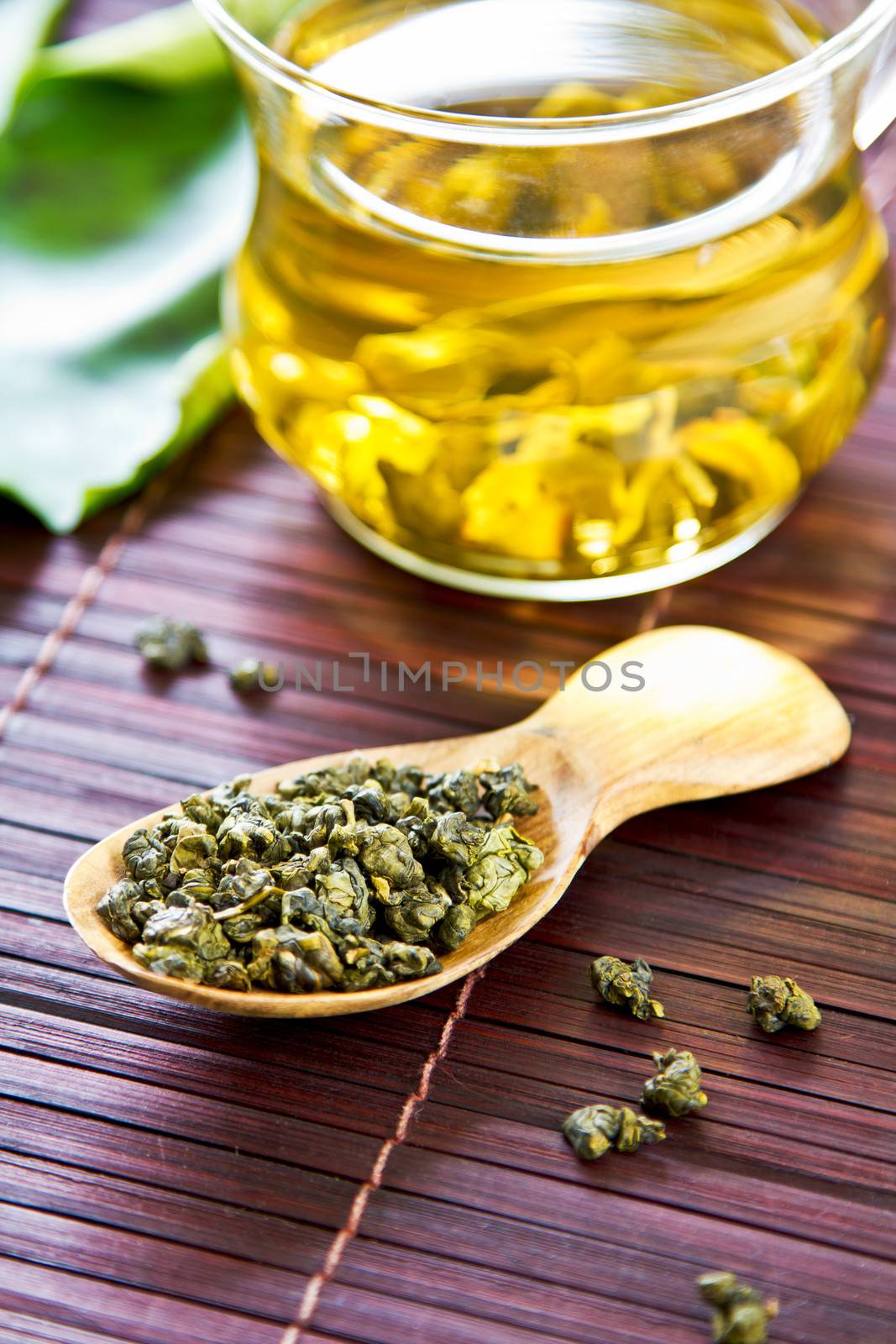 Oolong Tea leaf in wooden spoon