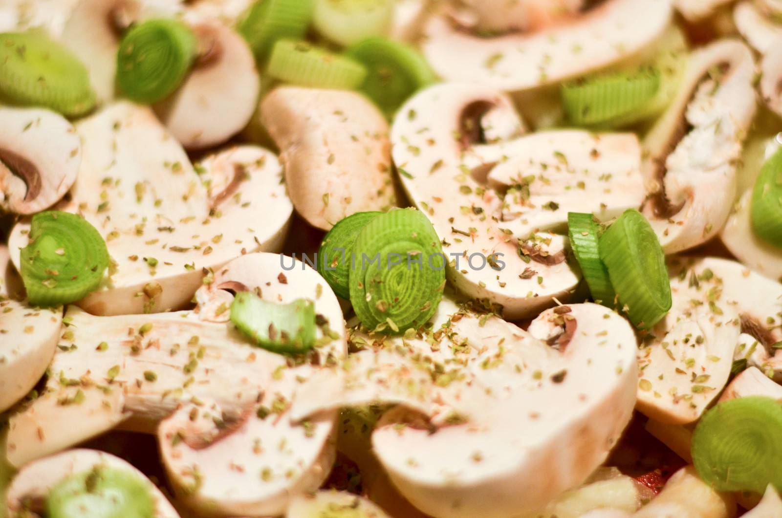 Mushrooms and leek on italian pizza macro