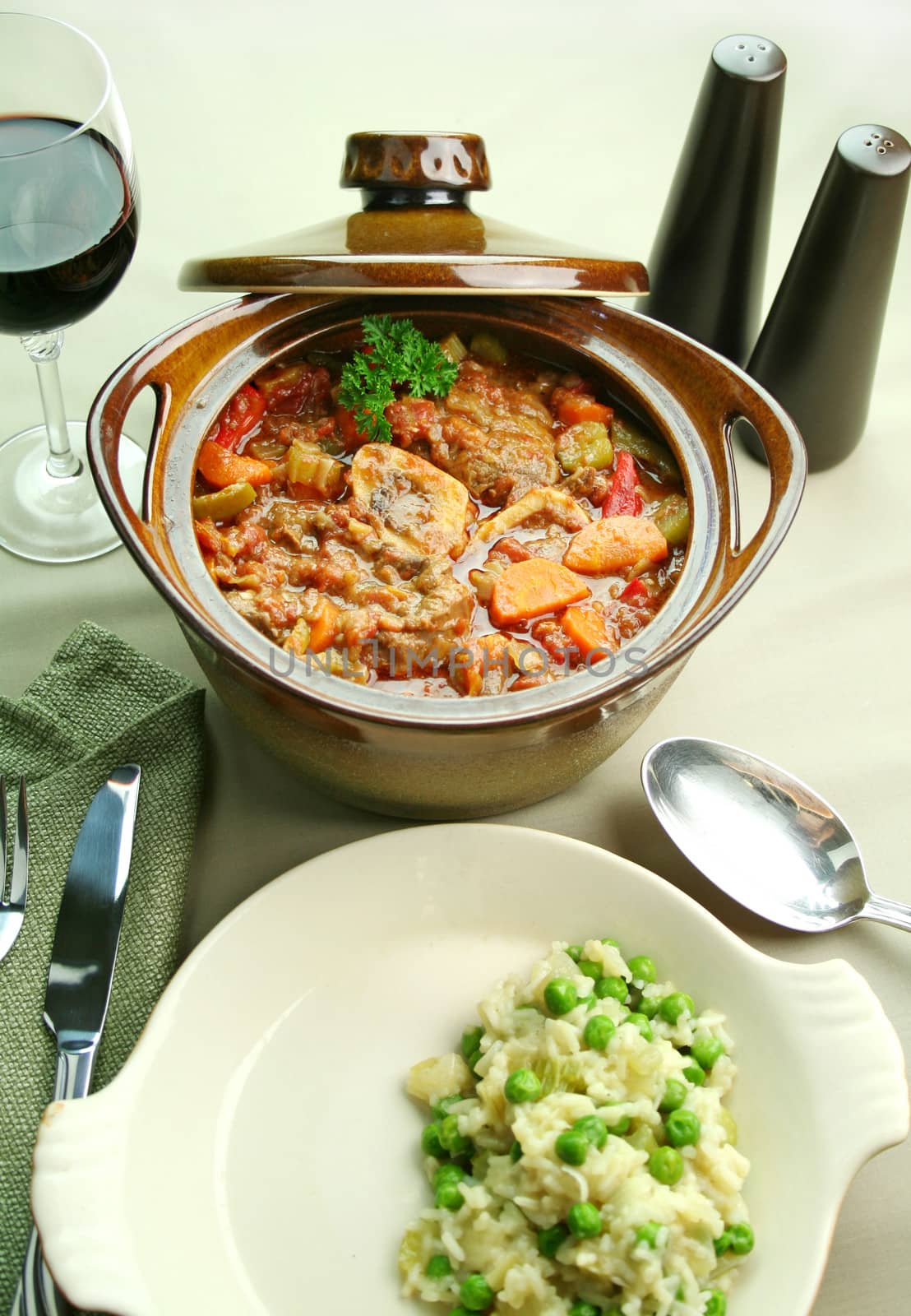 Slow roasted osso bucco with a green pea rice ready to serve.