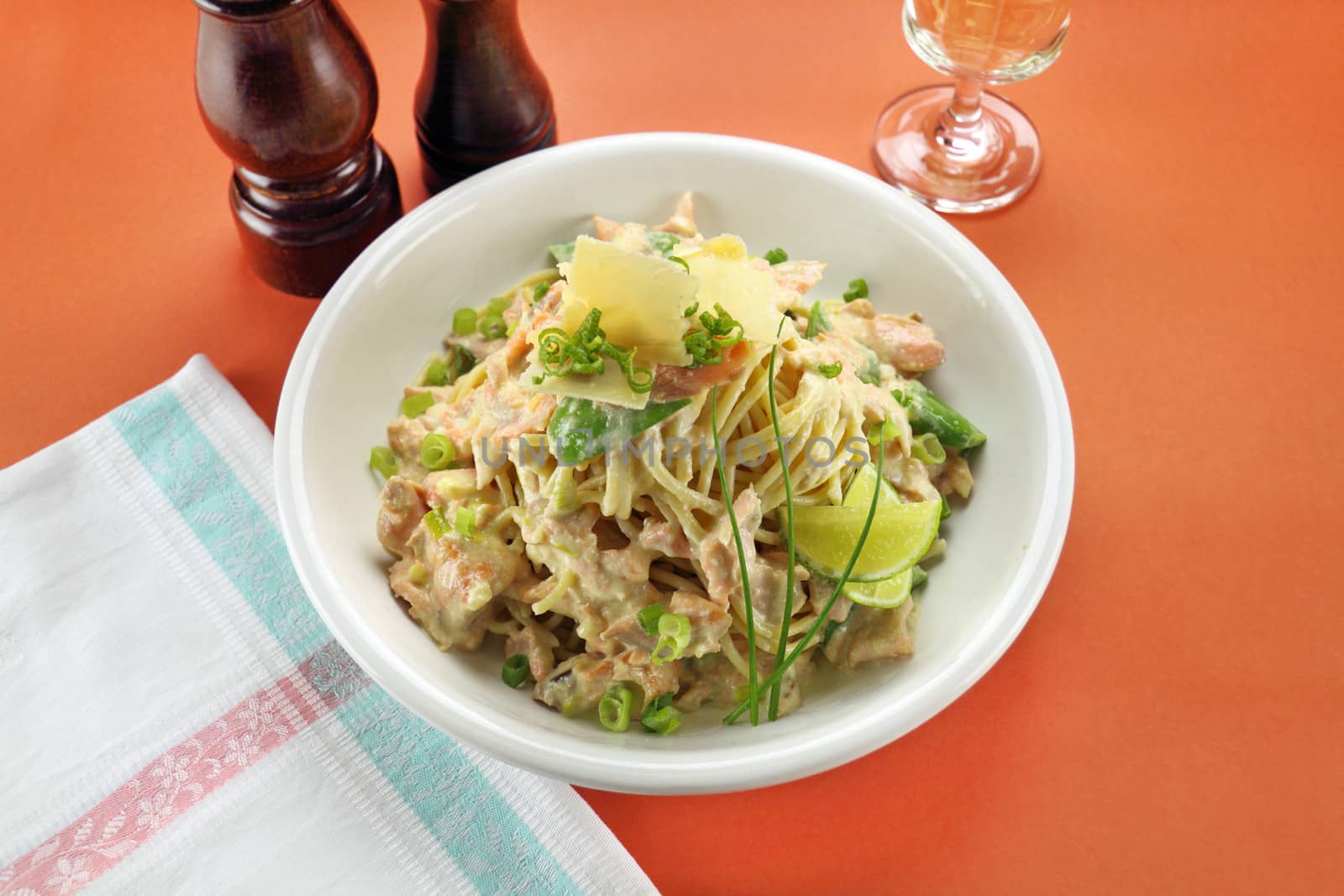 Delightful Italian spaghetti with creamy snow peas and salmon.