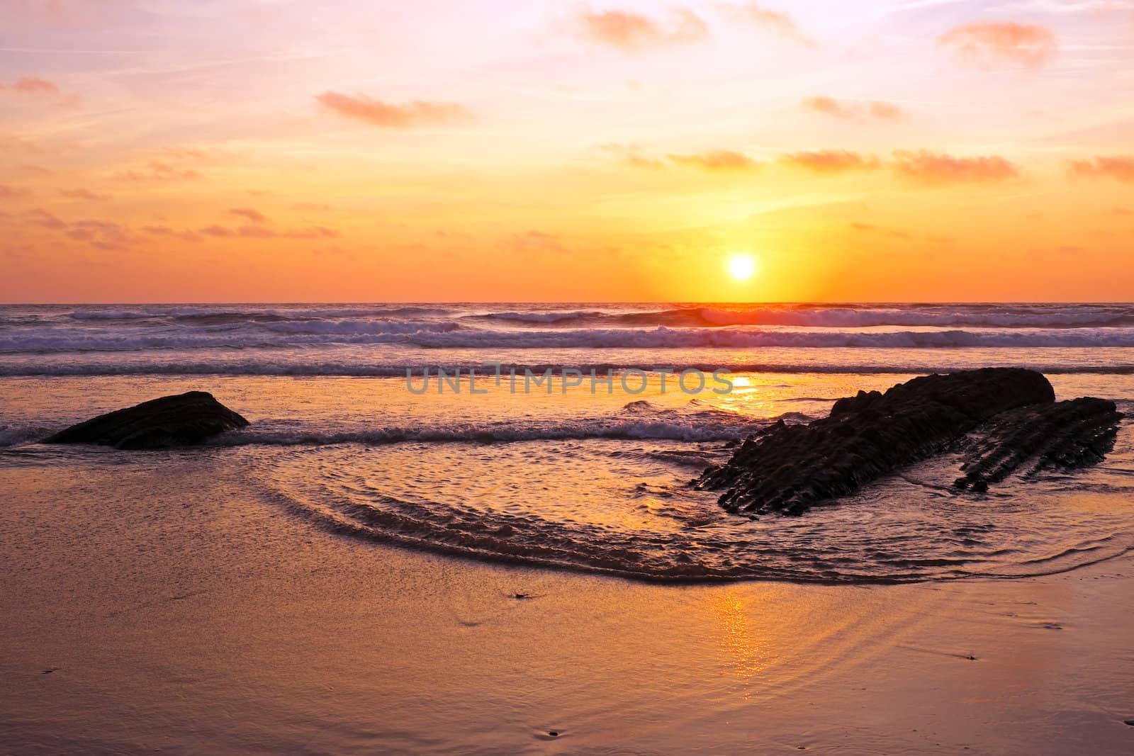 Sunset at praia vale figuiras in Portugal