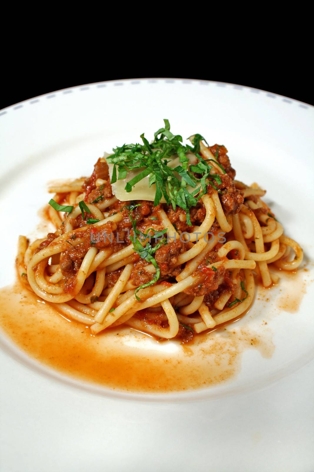 Delicious bolognese sauce and spaghetti mixed together.