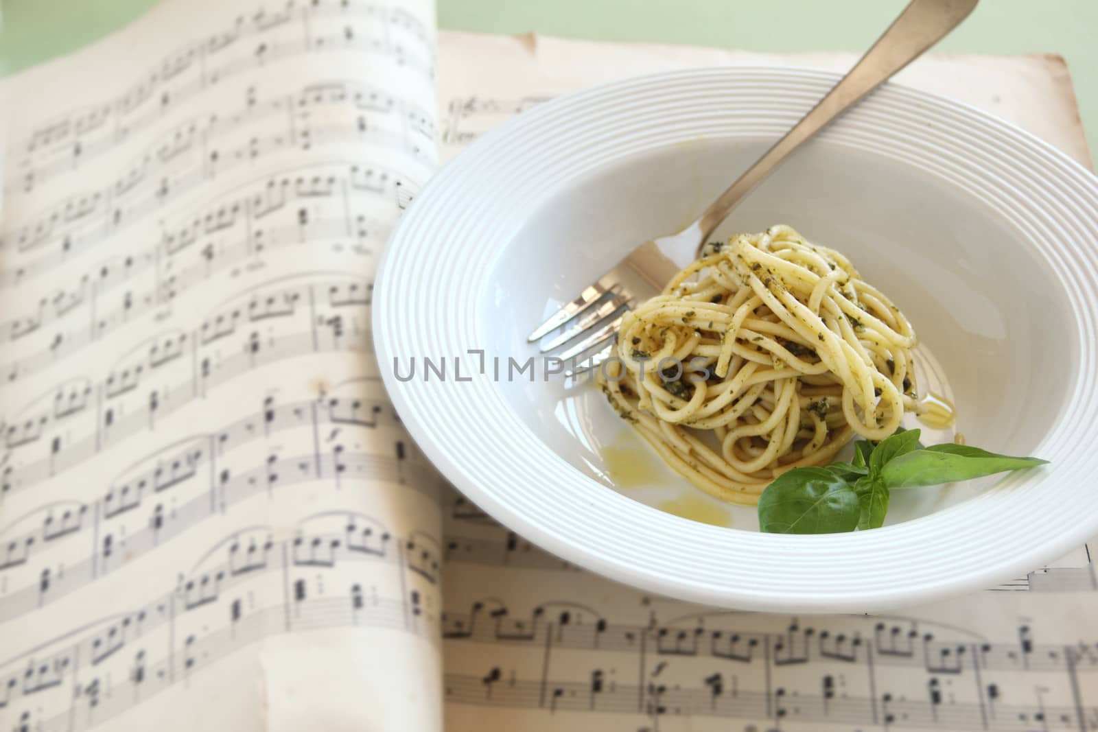 Delicious spaghetti with pesto ready to serve.