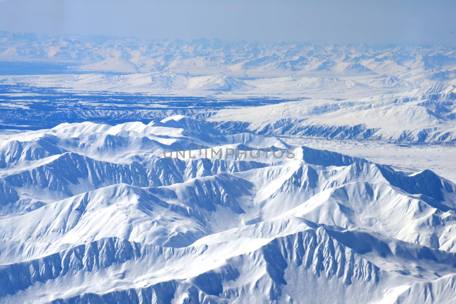 alaskan mountain as seen from bird eye view on a plane