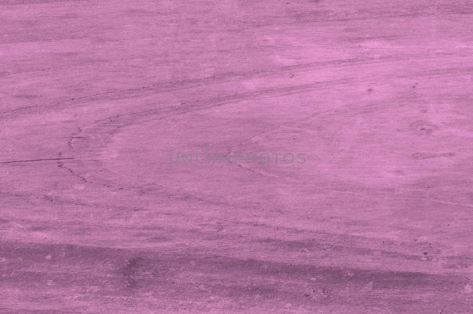 a pink background of distressed or grunge wood