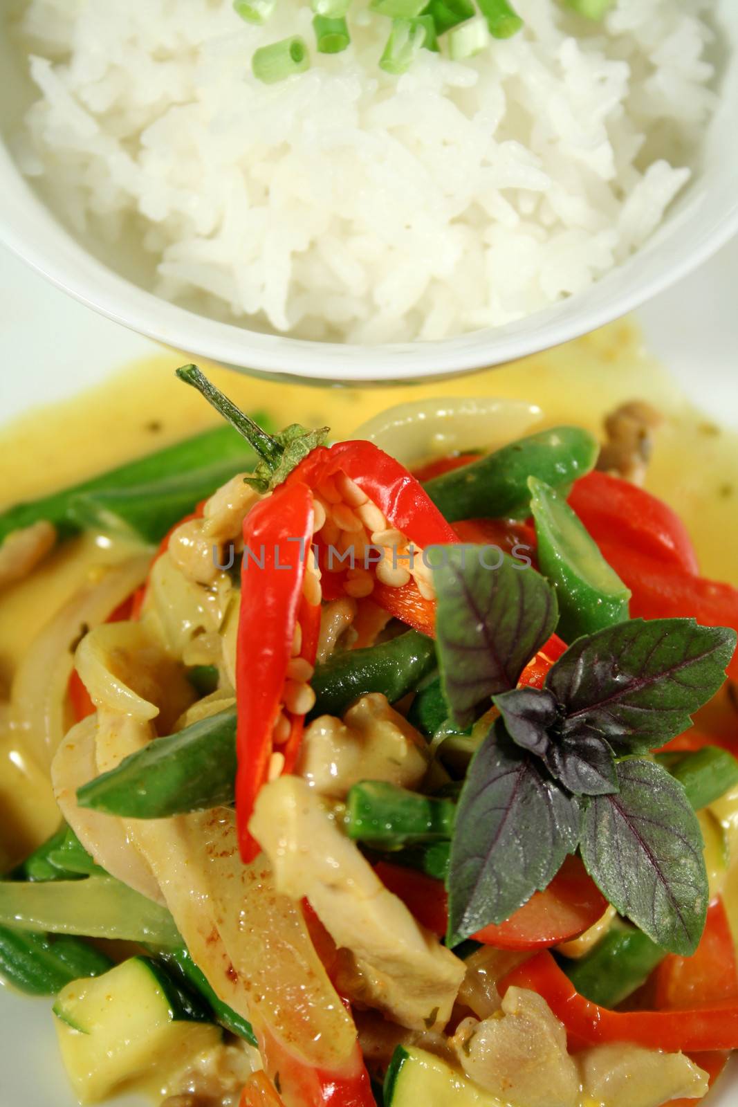 Delicious creamy Thai chicken curry with vegetables ready to go.