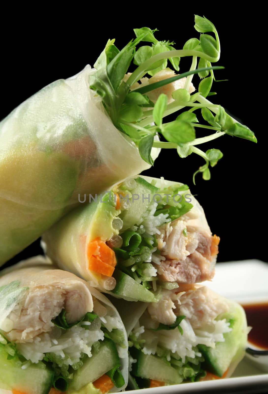 Delicious and healthy Vietnamese rice paper rolls with chicken and vegetables.