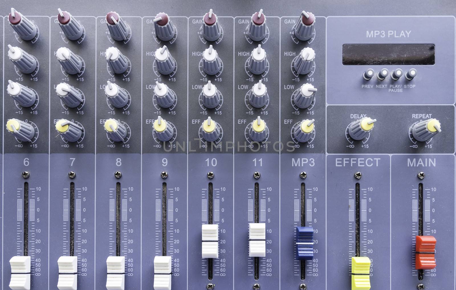 sliders of a mixing console. It is used for audio signals modifications