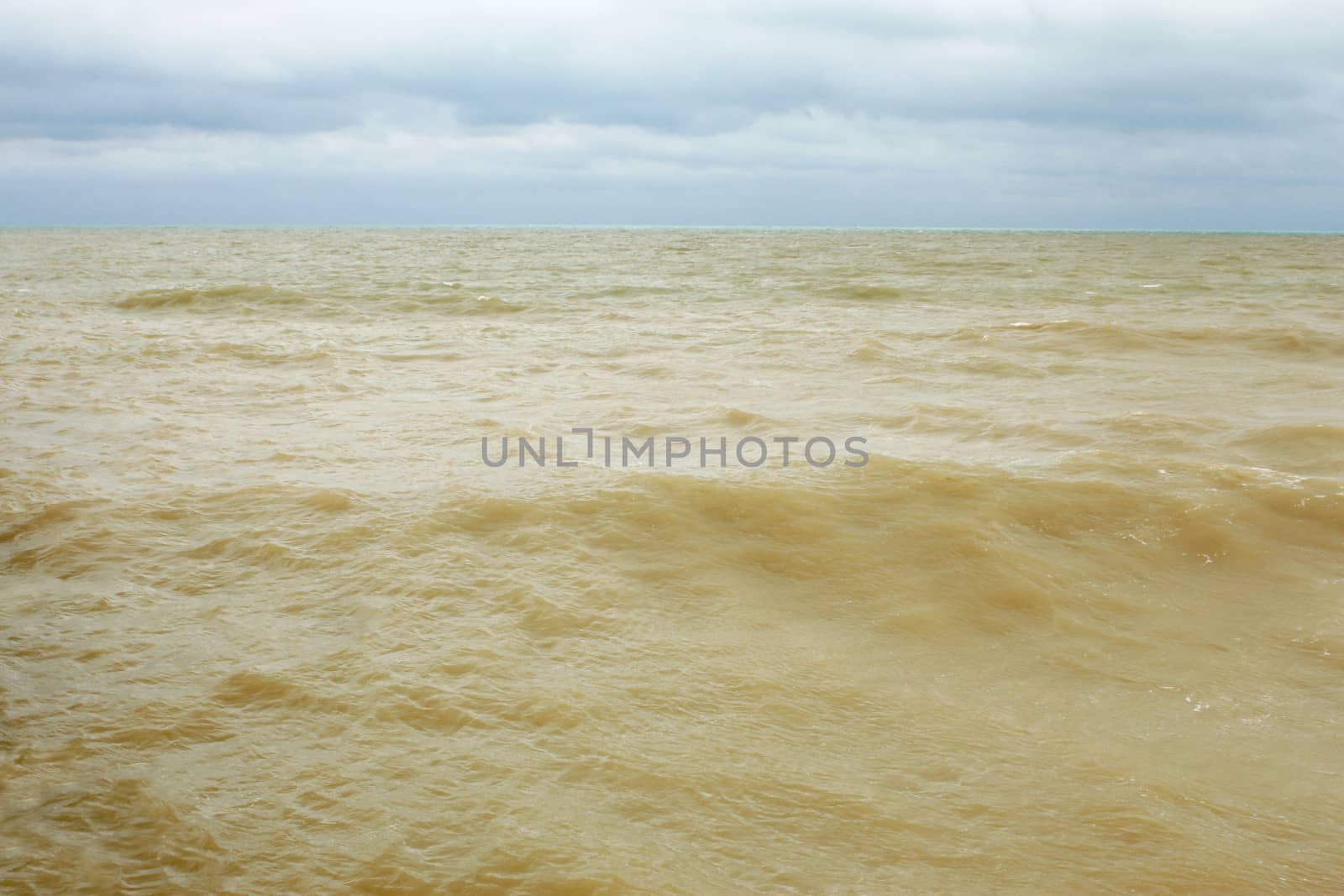 Coastal sea water after the storm contaminated dredged from the seabed sand