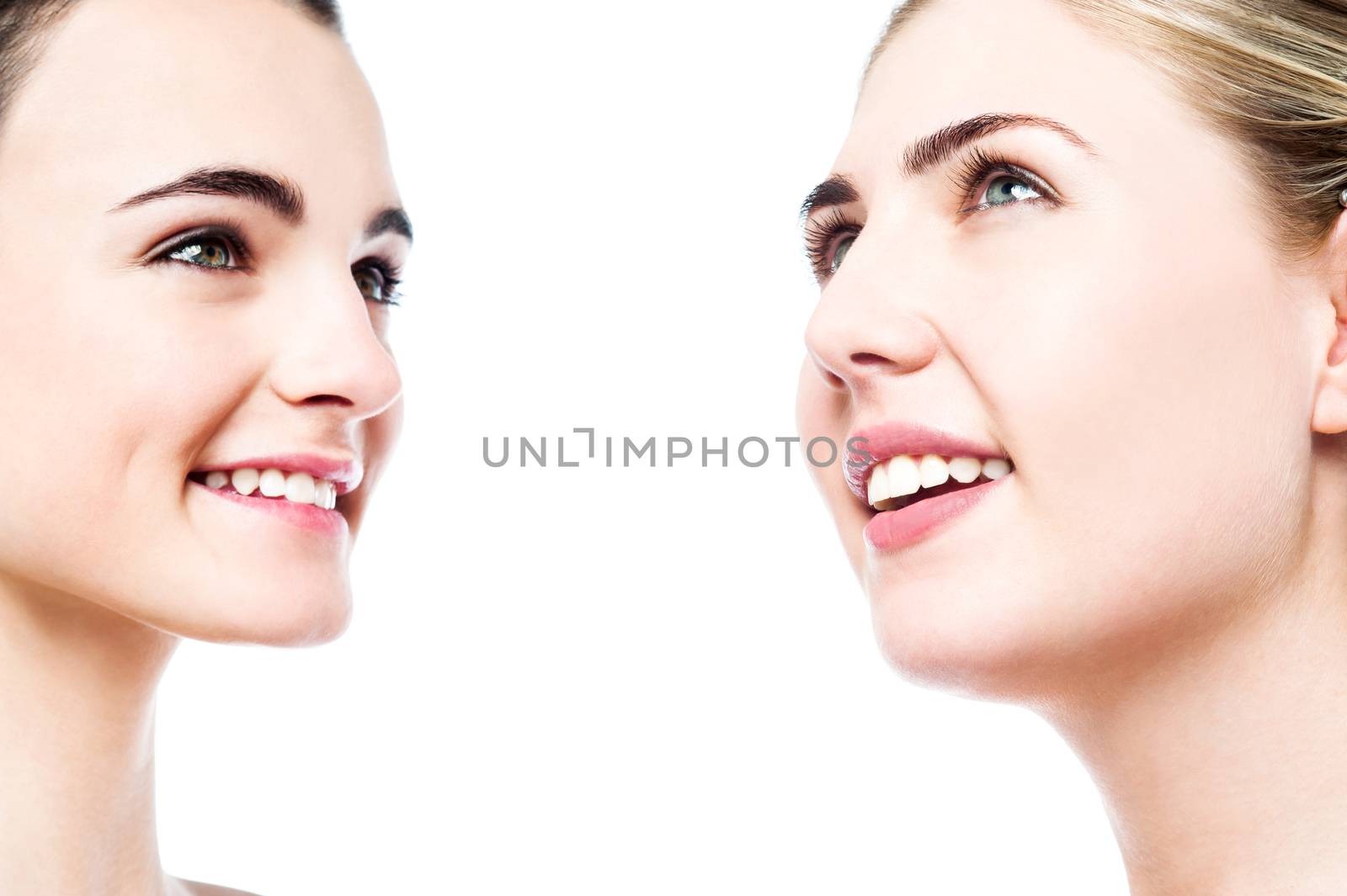 Headshot of beautiful young girls with clean skin by stockyimages