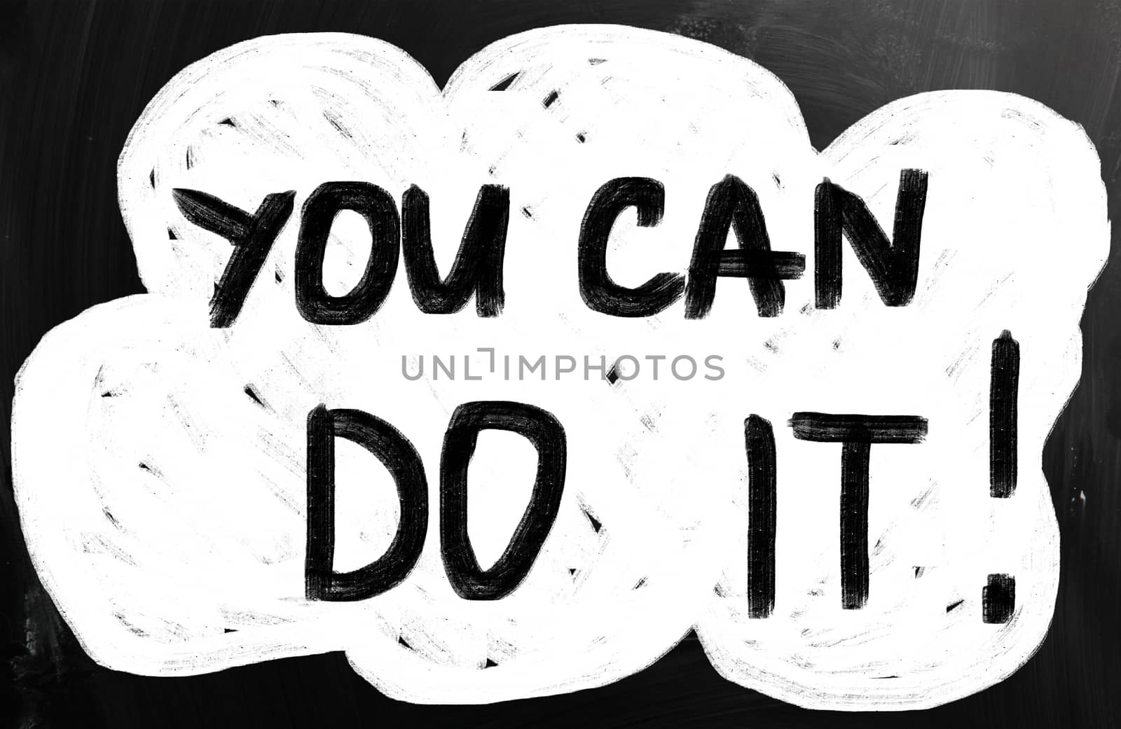 "You can do it" handwritten with white chalk on a blackboard.