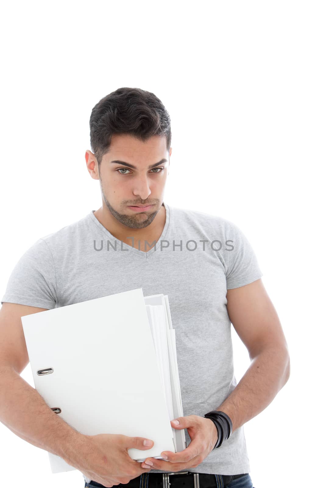 Muscular man holding a pile of folders over the white background