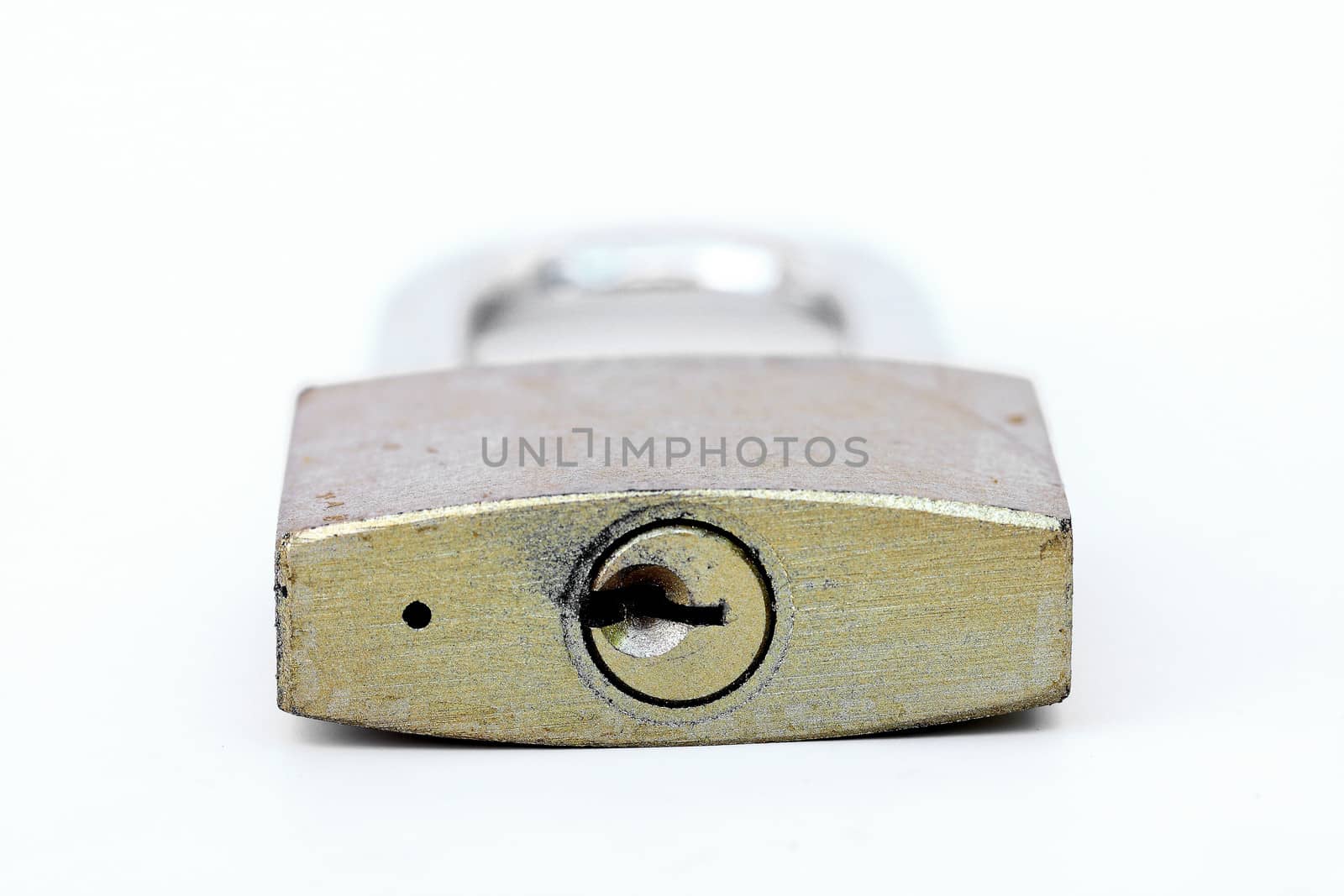 close up shot of old lock isolated on a white background  by myrainjom01