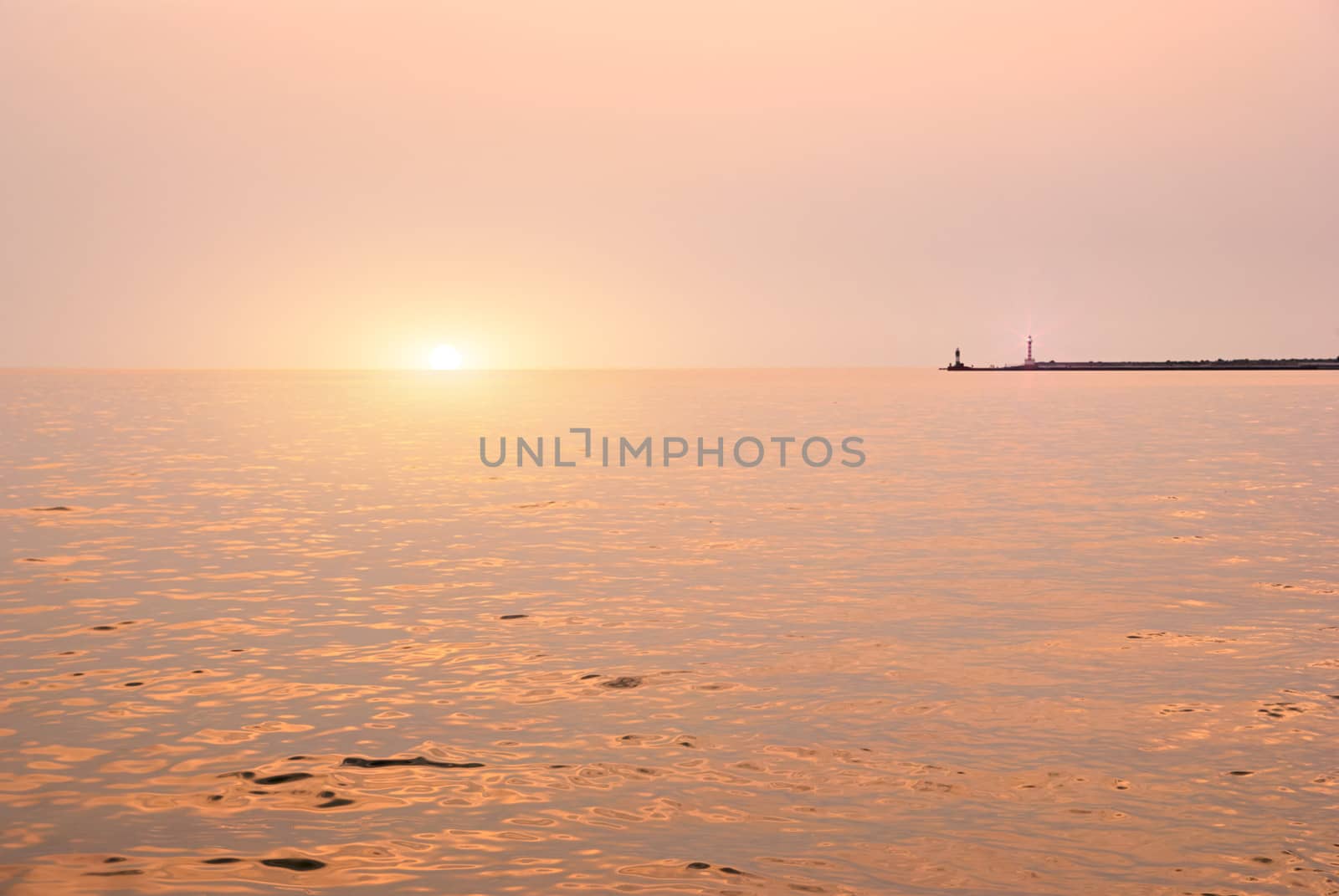 Beautiful seascape with orange warm sunrise, vacation concept