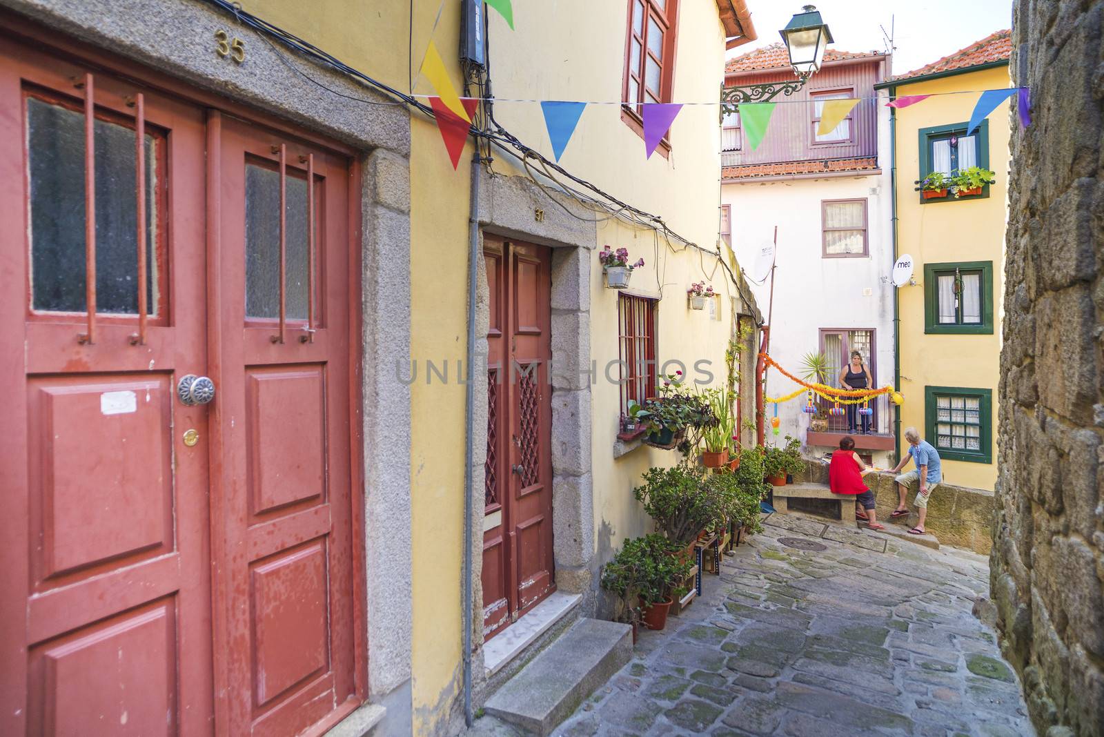 alley in old town porto portugal by jackmalipan