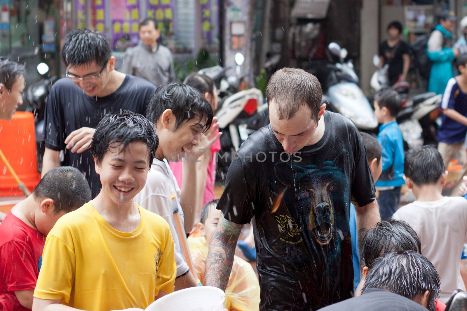 People celebrating Songkran in Taiwan by imagesbykenny