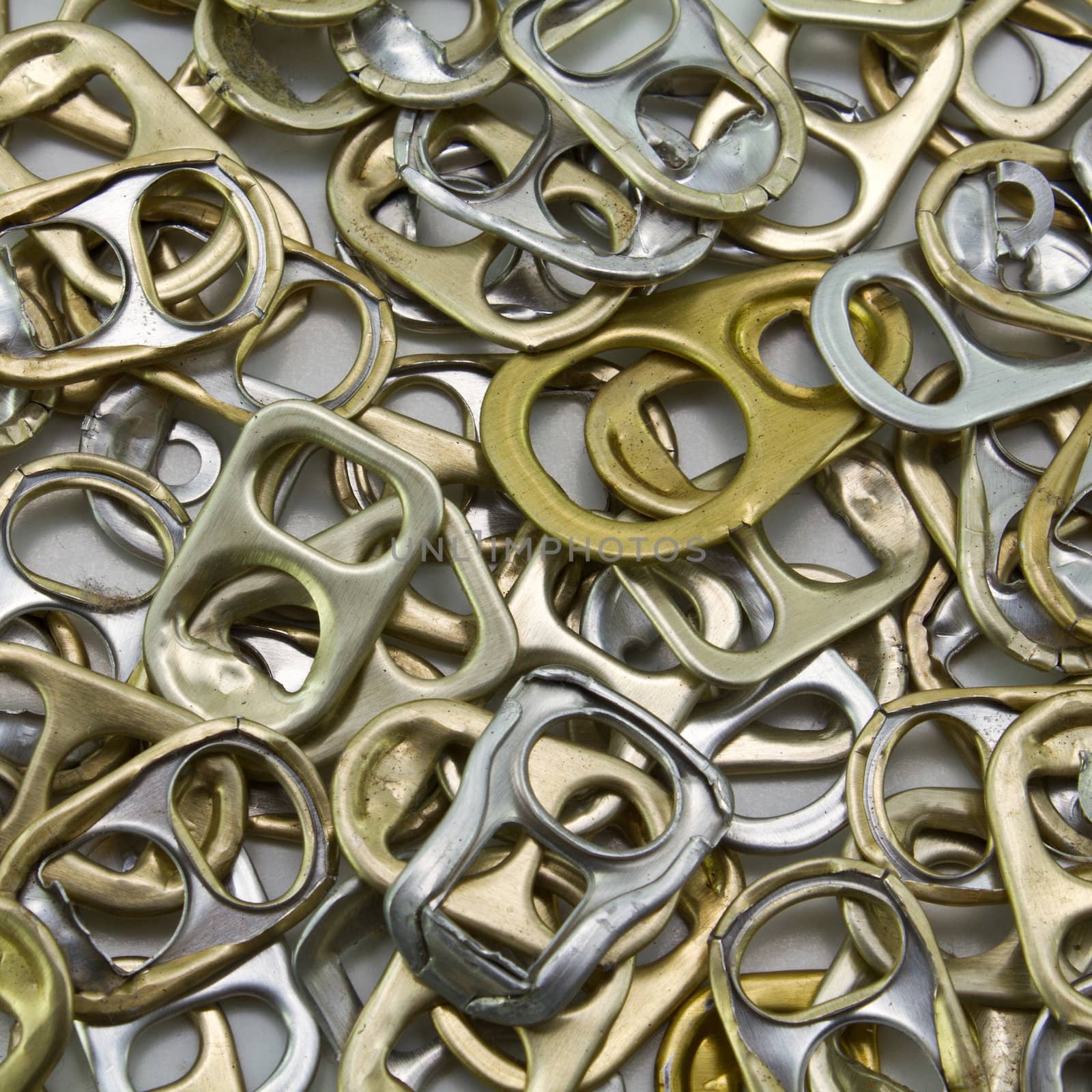 Metal ring pulls aluminum cans